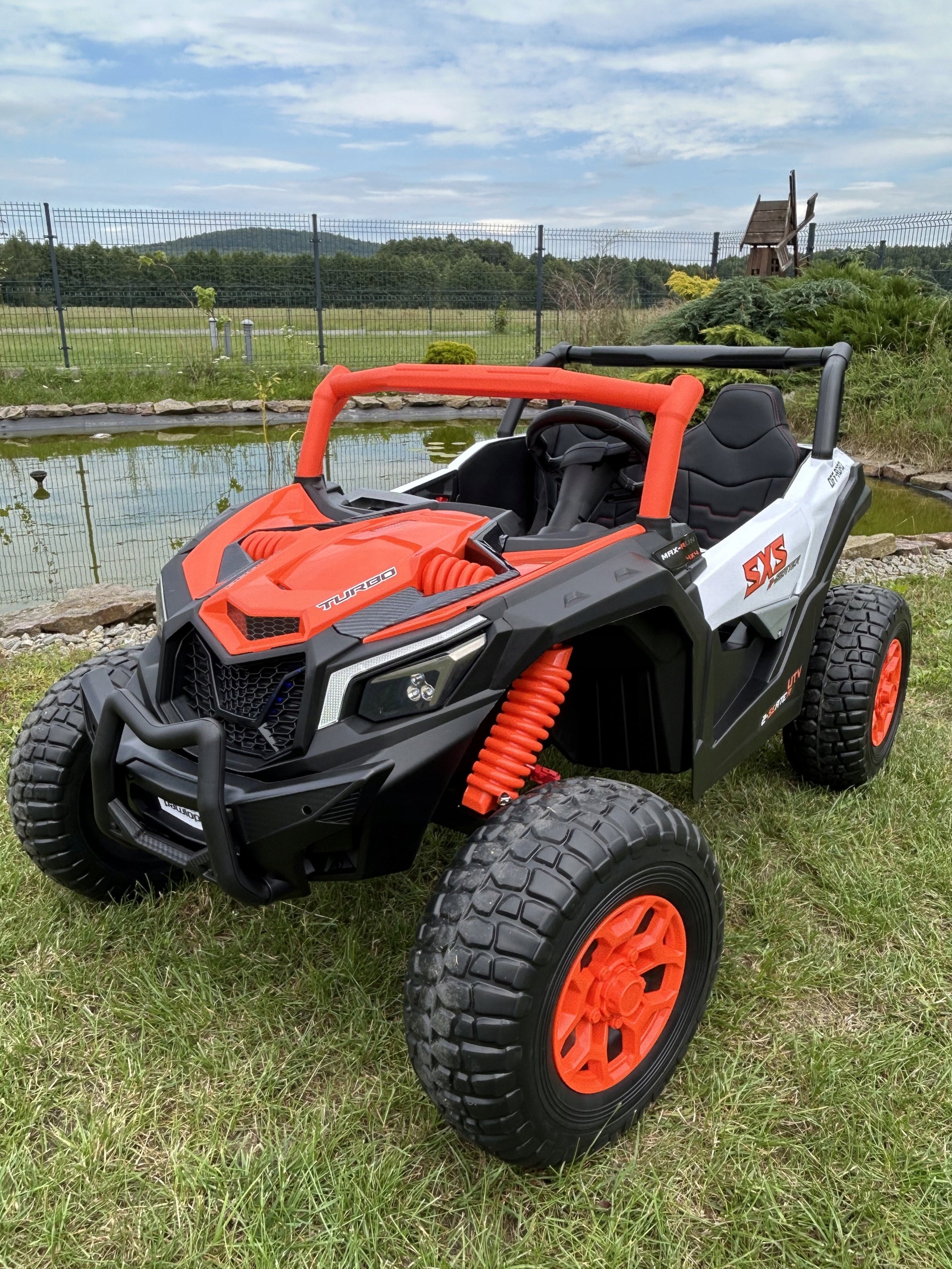 Auto Battery Operated Quad Buggy UTV X3 Off-Road 4 x 200W 24V Orange Packaging status original