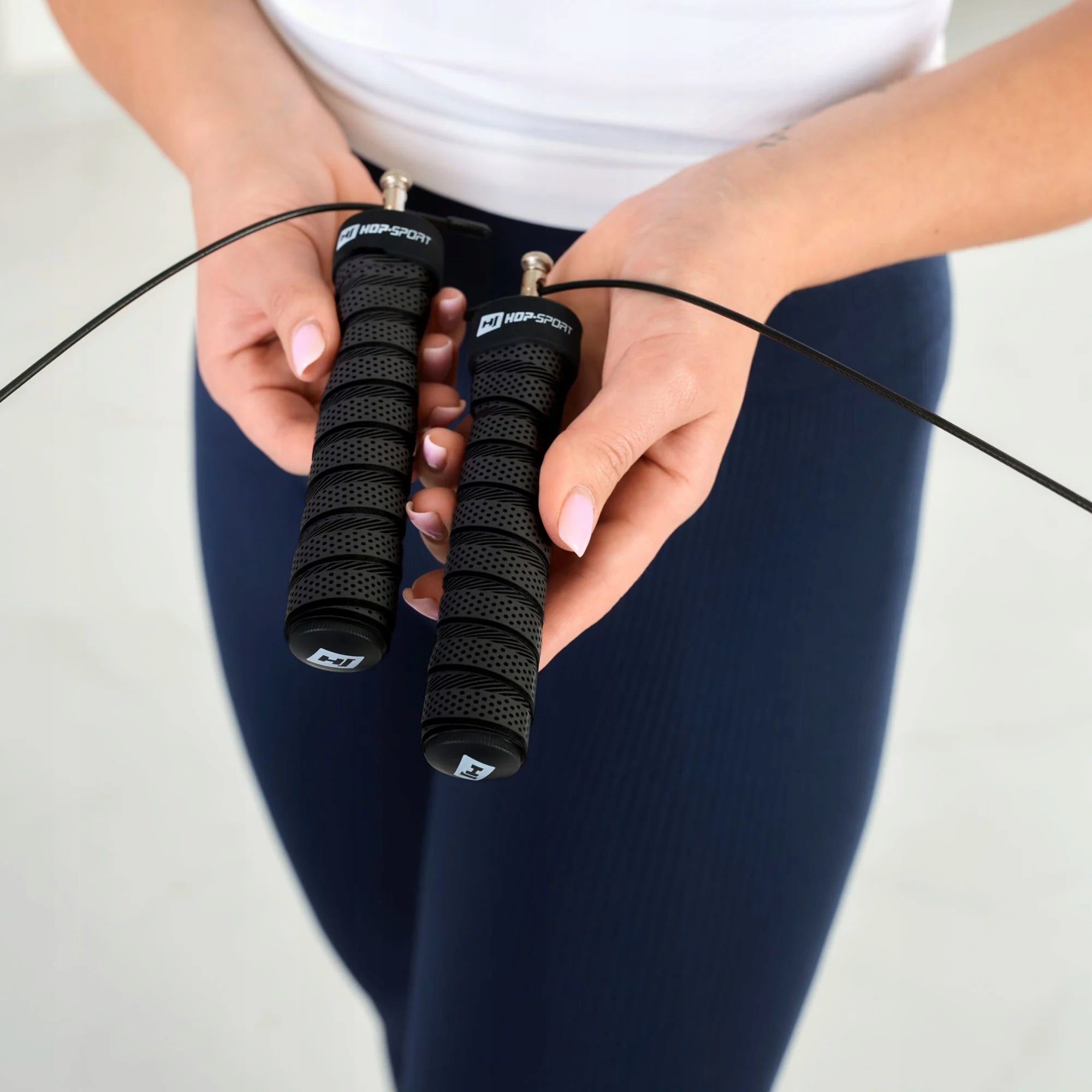 Black Adjustable Exercise Jump Rope with Bearings Non-Slip Handles Brand Hop-Sport