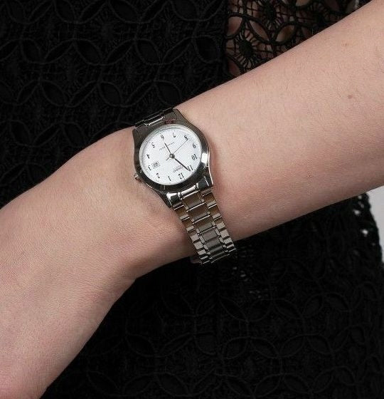 CLEAR AND ELEGANT WOMEN'S WATCH CASIO LTP-1141PA-7B WITH ARABIC NUMERALS Brand CASIO