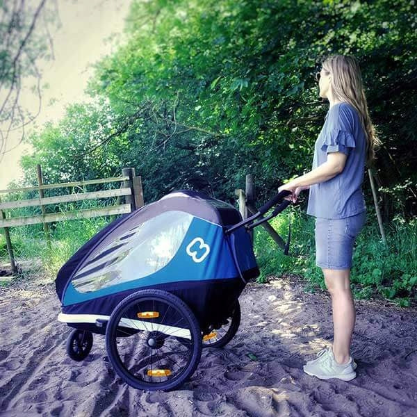 Children's bicycle trailer Hamax Traveller Twin Additional features safety flag rain cover brake mosquito net hi-vis reflectors sun visors pumped wheels cargo space foldable trailer design bicycle trailer hook