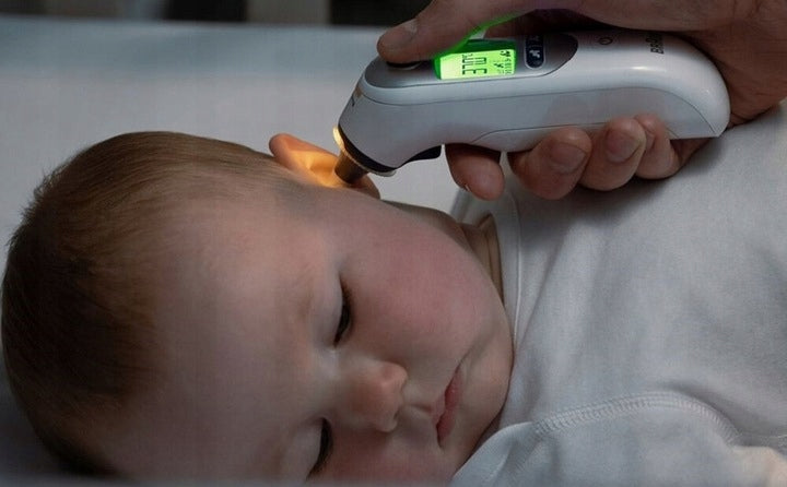 ELECTRONIC THERMOMETER FOR EAR BRAUN HEATED TIP 34° C FLASHLIGHT Batteries included yes