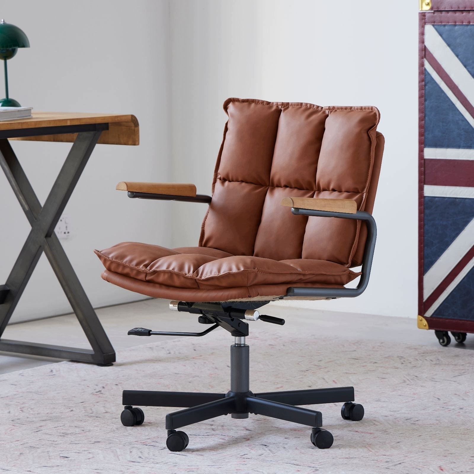 Ergonomic leather office chair with wheels and armrests Furniture depth 46 cm
