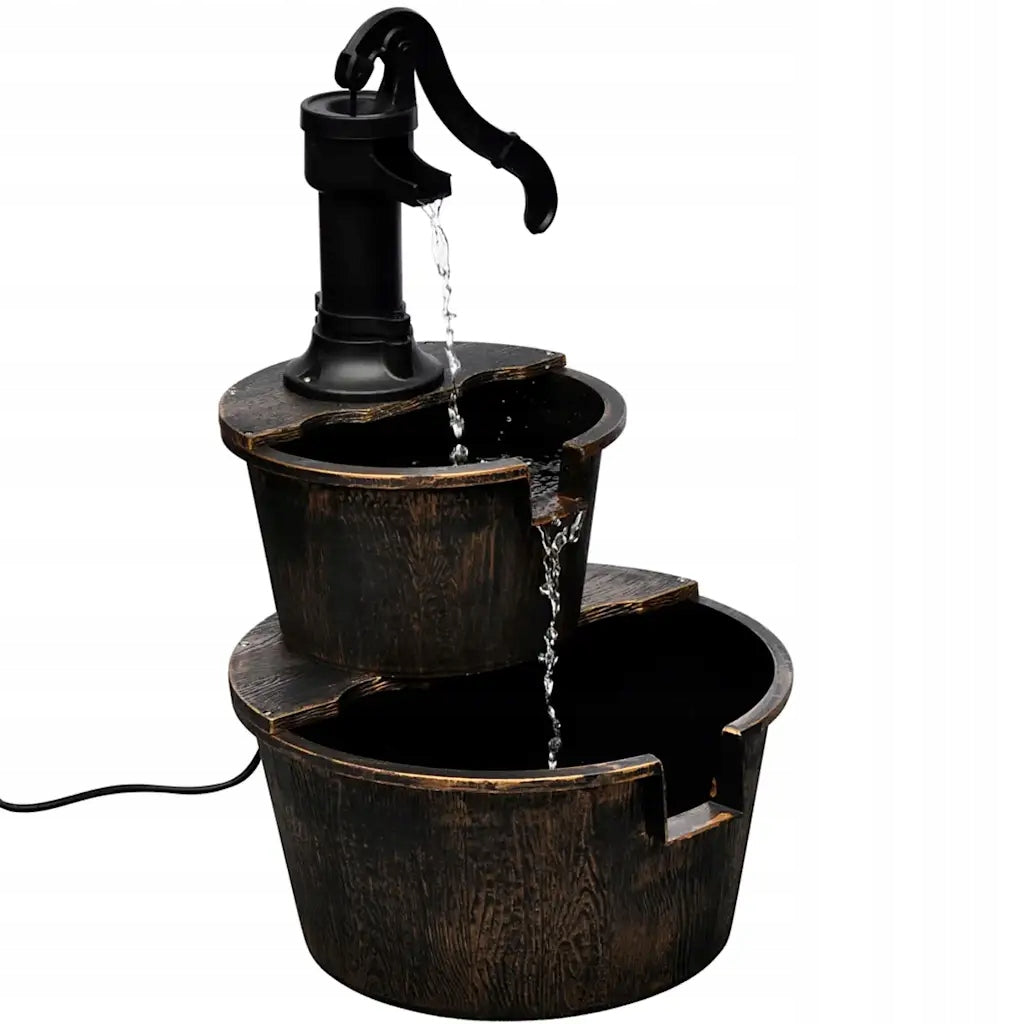 Fountain in the form of a well with a pump