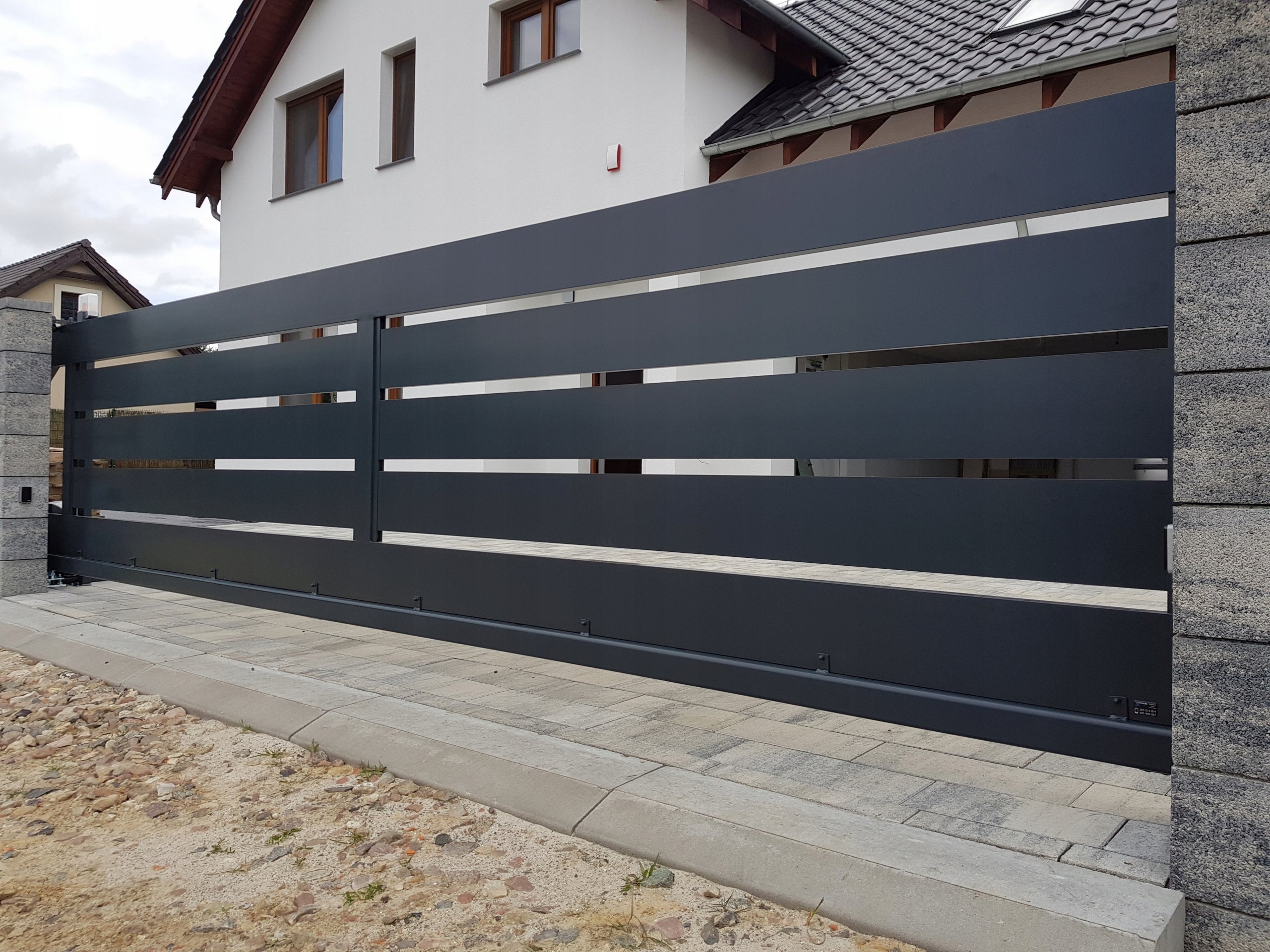 Modern aluminum sliding gate. Gate type sliding