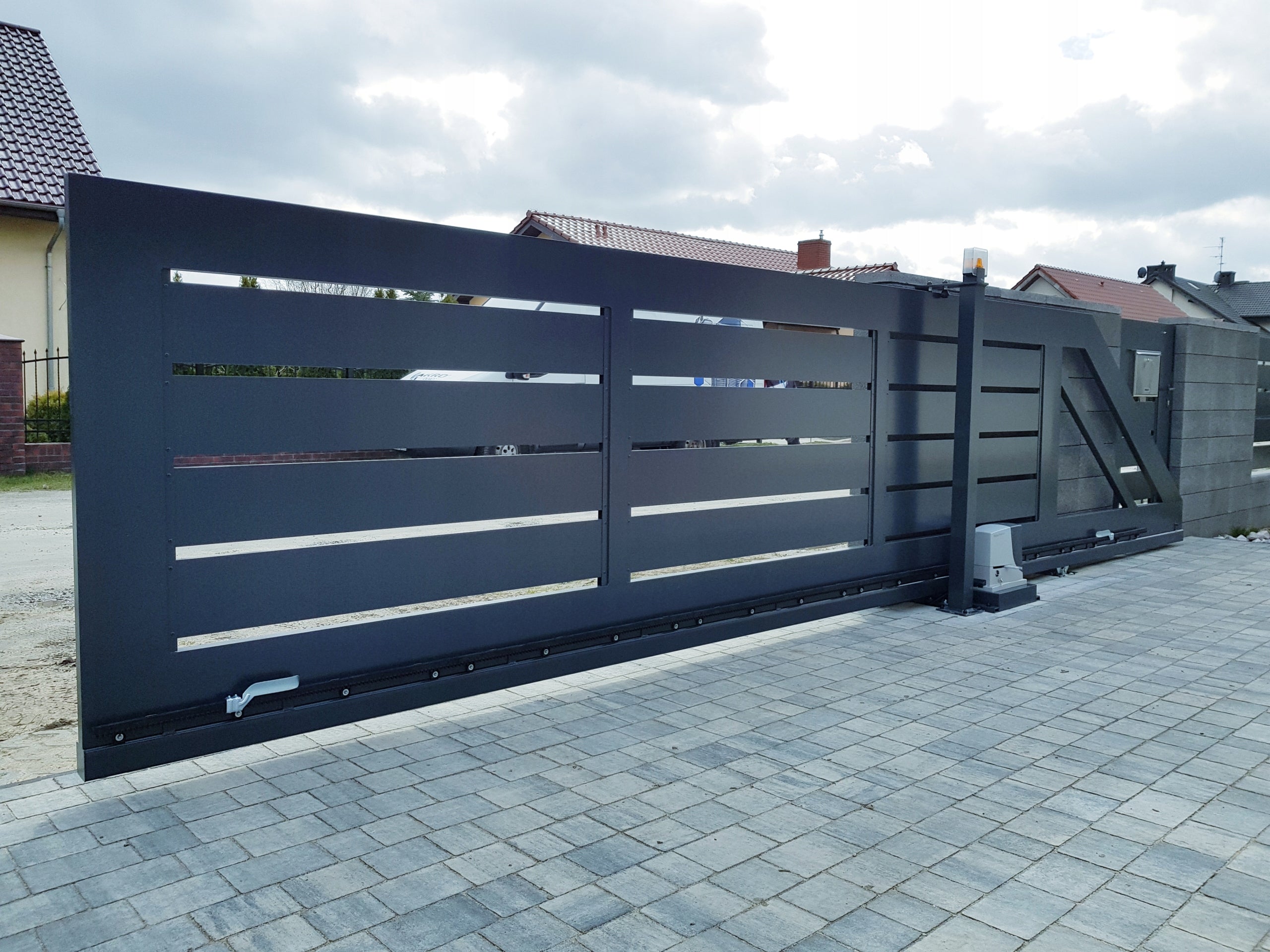 Modern aluminum sliding gate.