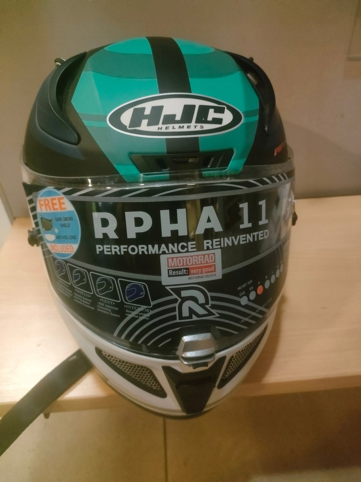 Motorcycle helmet HJC RPHA 11Naxos r. S white and grey blue Manufacturer's catalog number R-PHA-11_STO-MC1_S