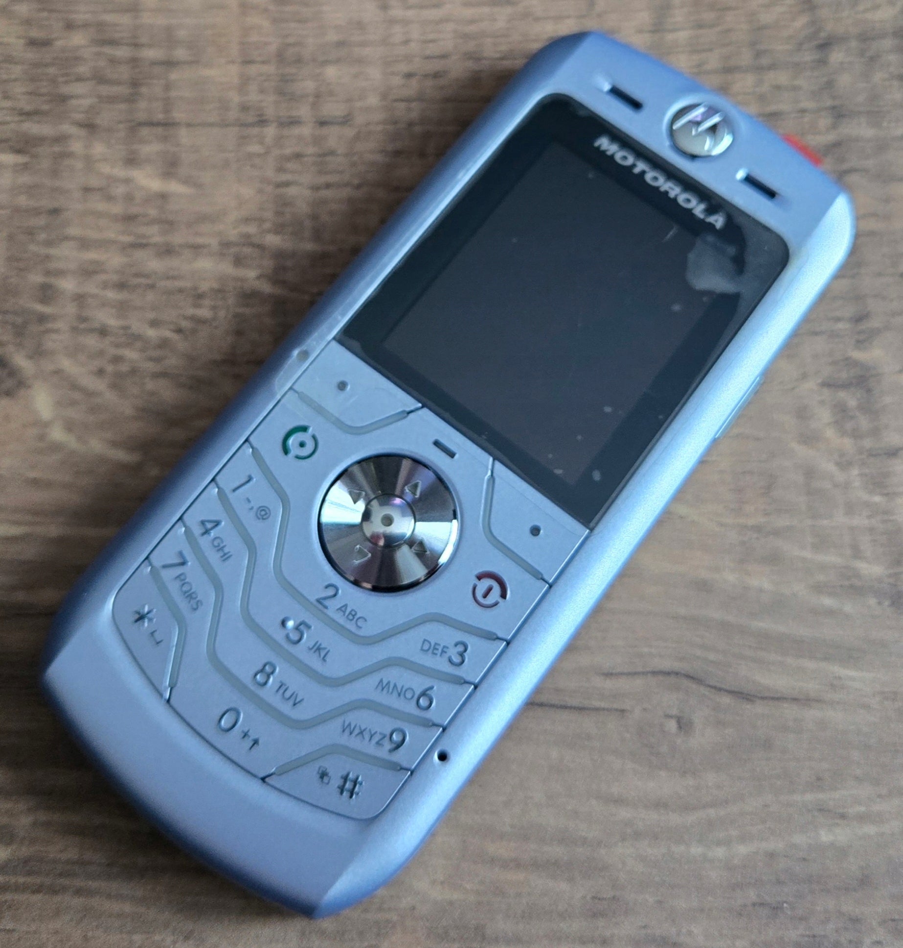 Motorola L6 Silver Set ! NEW ! MEGA UNIQUE ! Foils ! The only one! Charger included yes