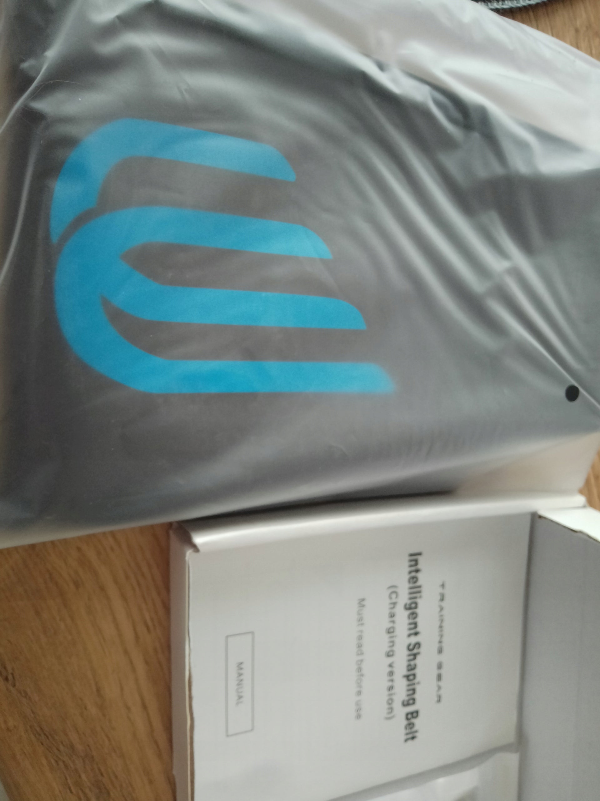 Nitoer EMS Muscle Stimulator Packaging status original