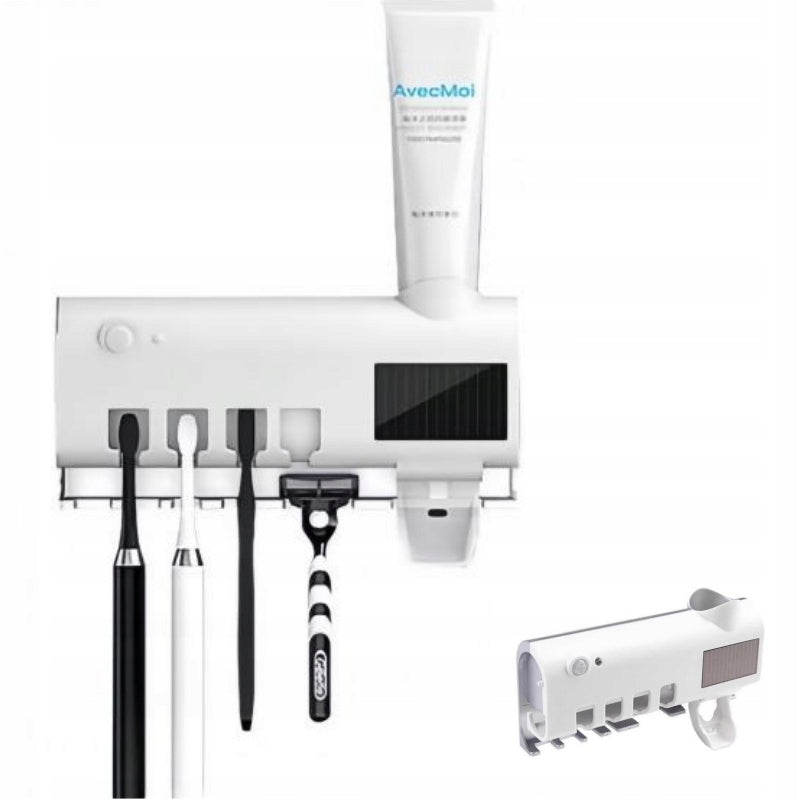 Paste dispenser with handle and UV sterilizer with motion sensor on brush