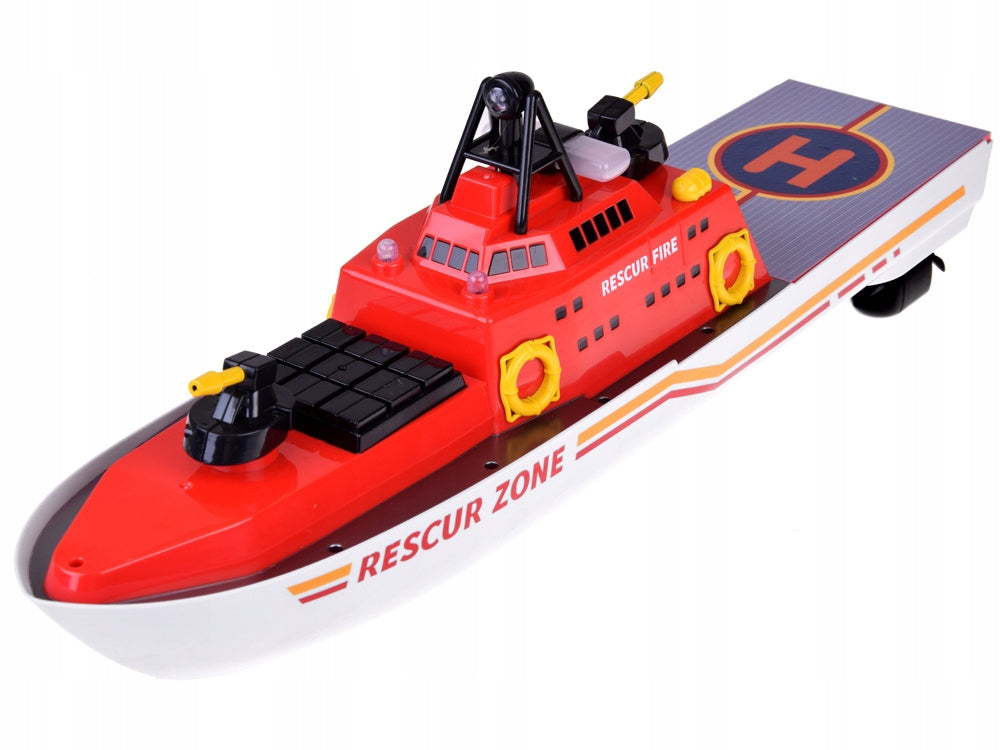 REMOTE CONTROLLED FIRE BOAT SWIMS GLOWS SHOOTS WATER Brand Jokomisiada
