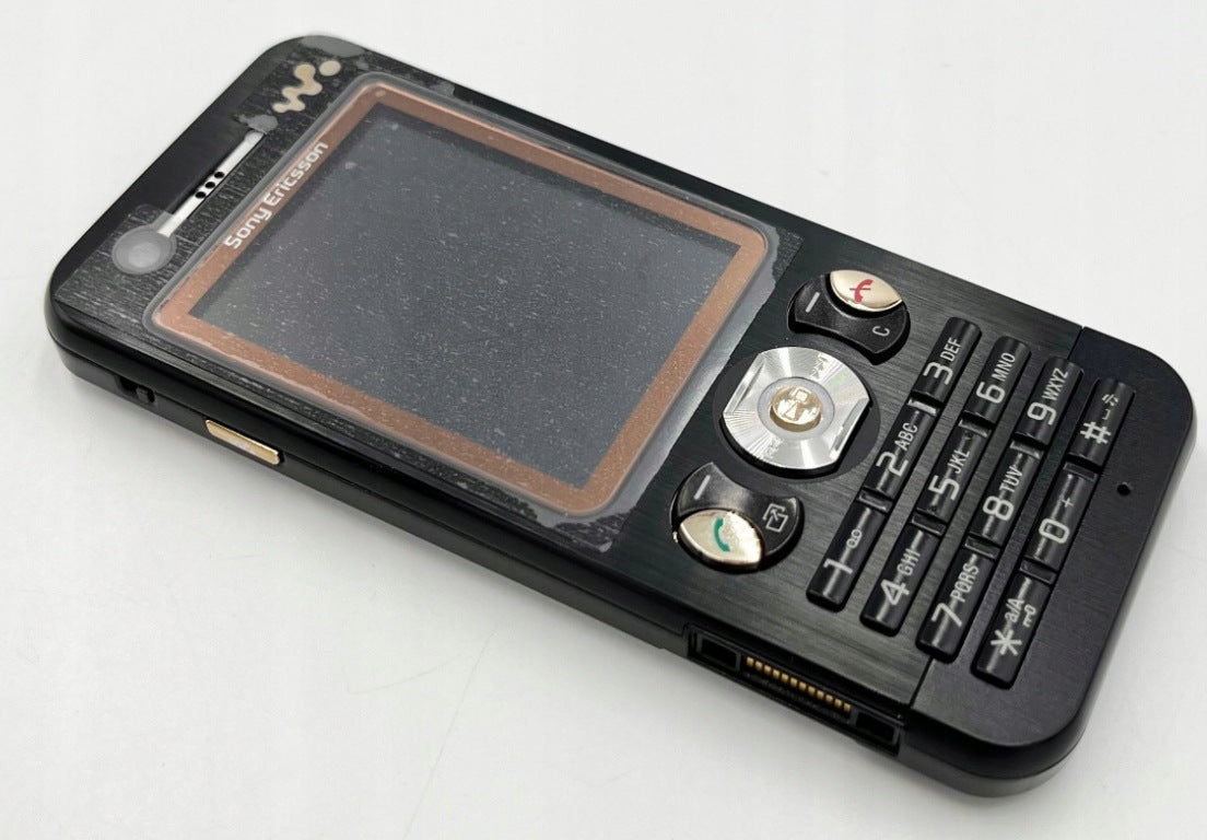 SONY ERICSSON W890i NEW + BATTERY + CHARGER Headphones included no