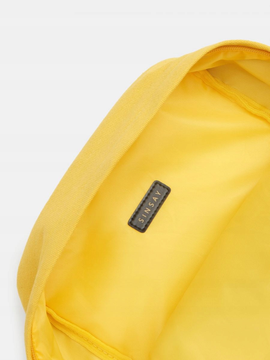 ST877 yellow backpack patches 23x 32 cm Brand sinsay
