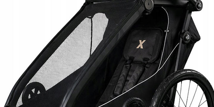 X-lander Booster 1 Pro Children's Bike Trailer 3in1 Additional features rain cover jogger function brake stroller front wheel included mosquito net hi-vis reflectors sun visors lighting securing straps cargo space waterproof bicycle trailer hook walking set