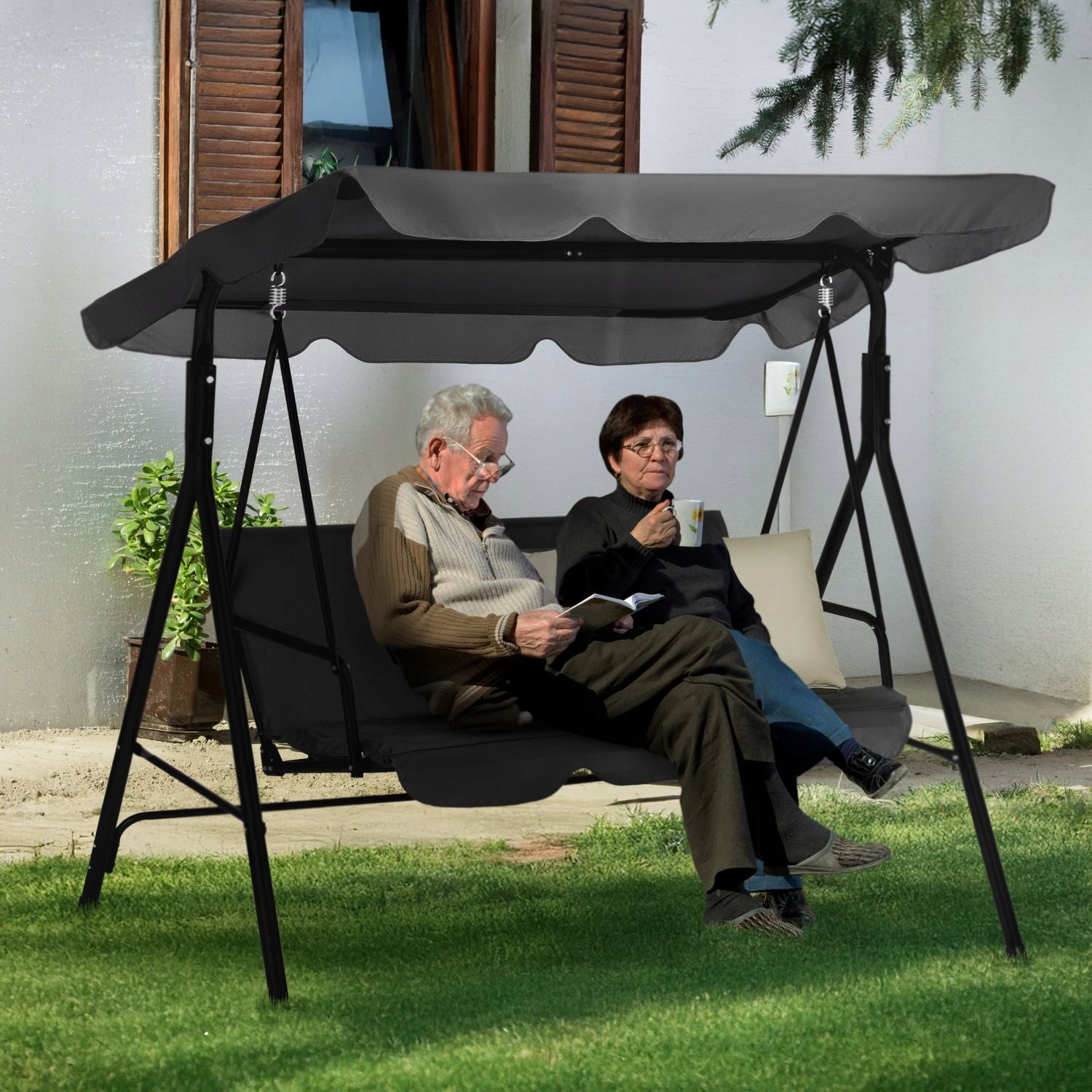 3 SEATER FREESTANDING GARDEN SWING WITH VISOR AND CUSHIONS LUVERNO Kind freestanding
