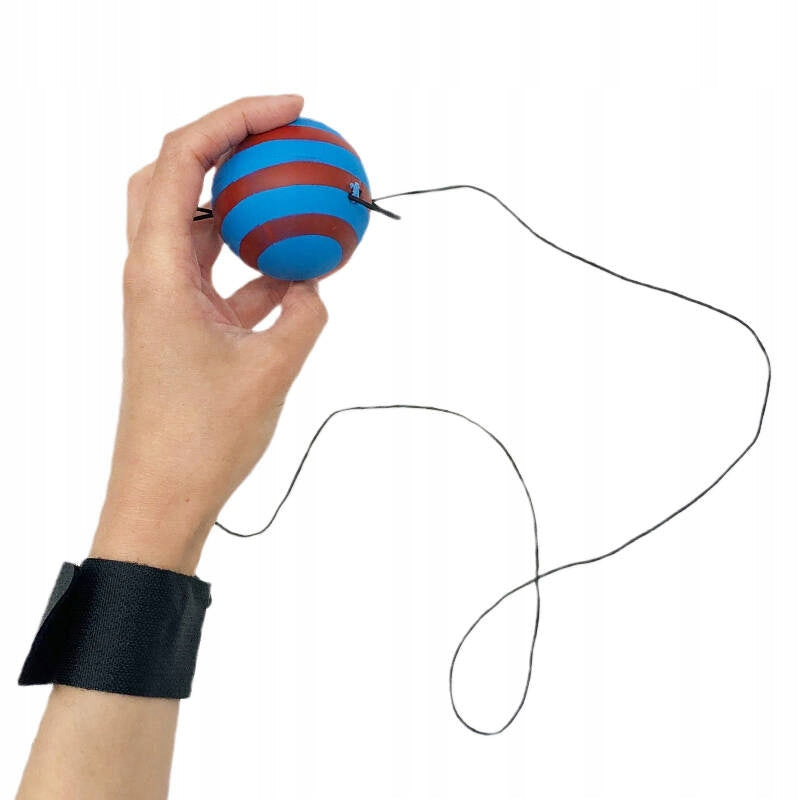 Ball ball on elastic band arcade game on hand