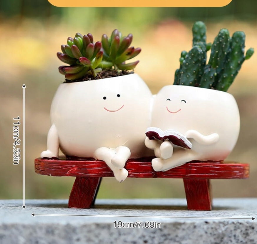 CUTE FLOWER POT WITH FACES WITH A SMILE ON THE BENCH POTS DECORATIONS Brand no brand