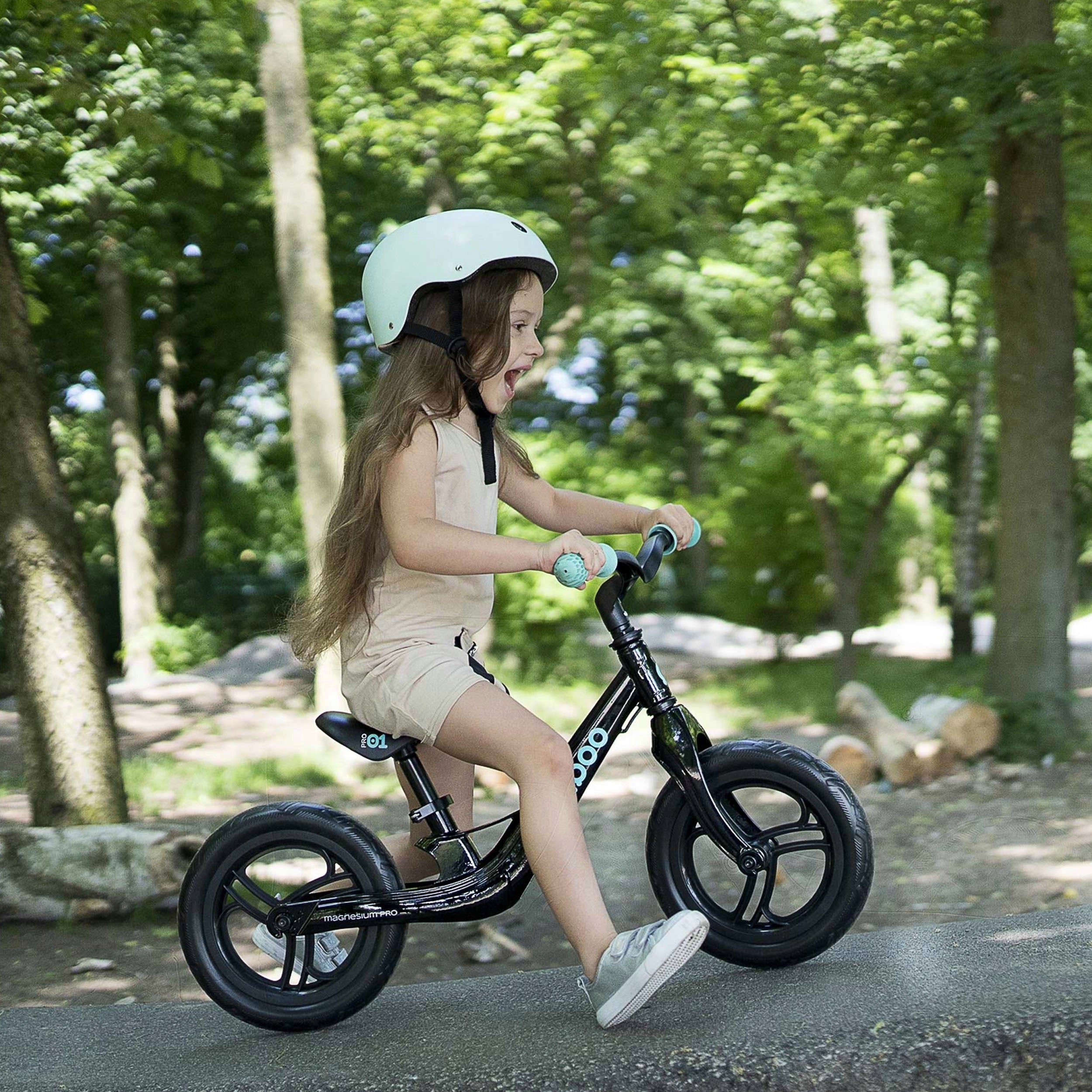 Cariboo Magnesium Pro balance bike (black and turquoise) Frame size 12"