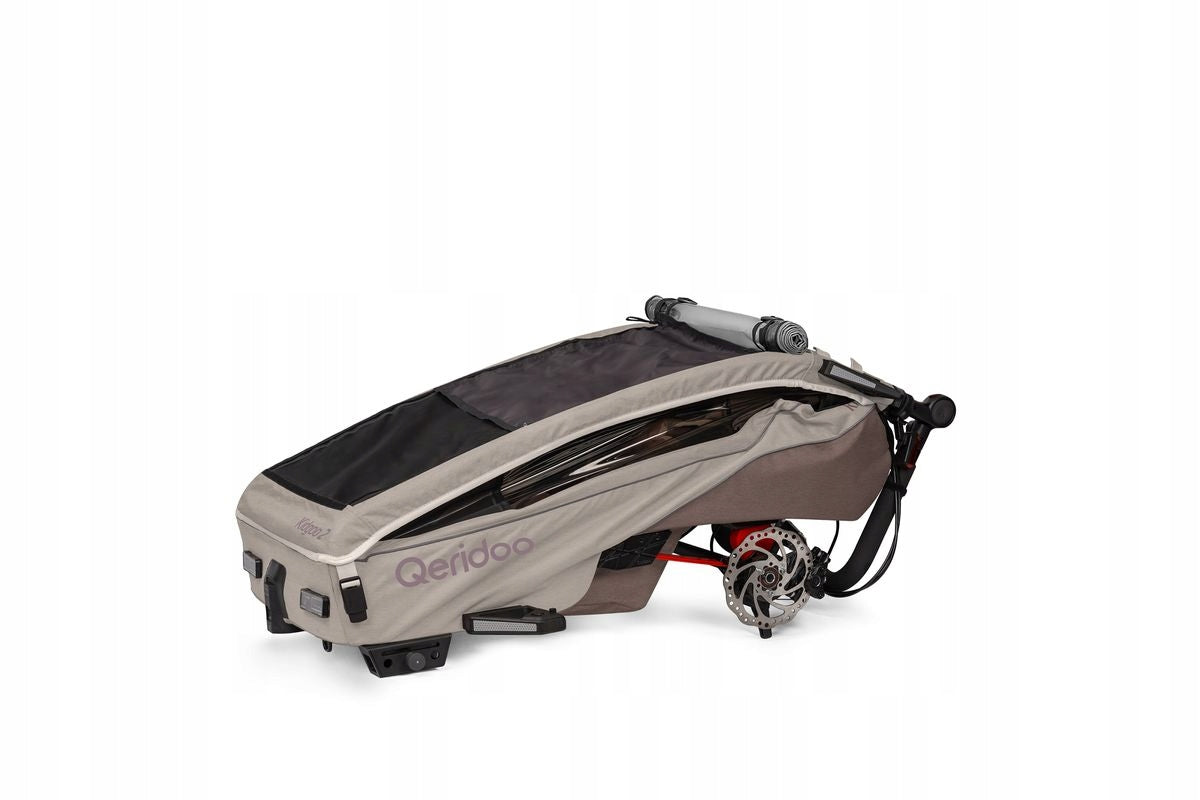 Children's Bicycle Trailer Qeridoo KidGoo 2 Pro Gen 2 Barista Brown Additional features shock absorption safety flag rain cover jogger function brake mosquito net hi-vis reflectors sun visors lighting pumped wheels cargo space foldable trailer design bicycle trailer hook pockets stroller front wheel included axle-mounted 5-point harness partitions adjustable handles waterproof walking set covered
