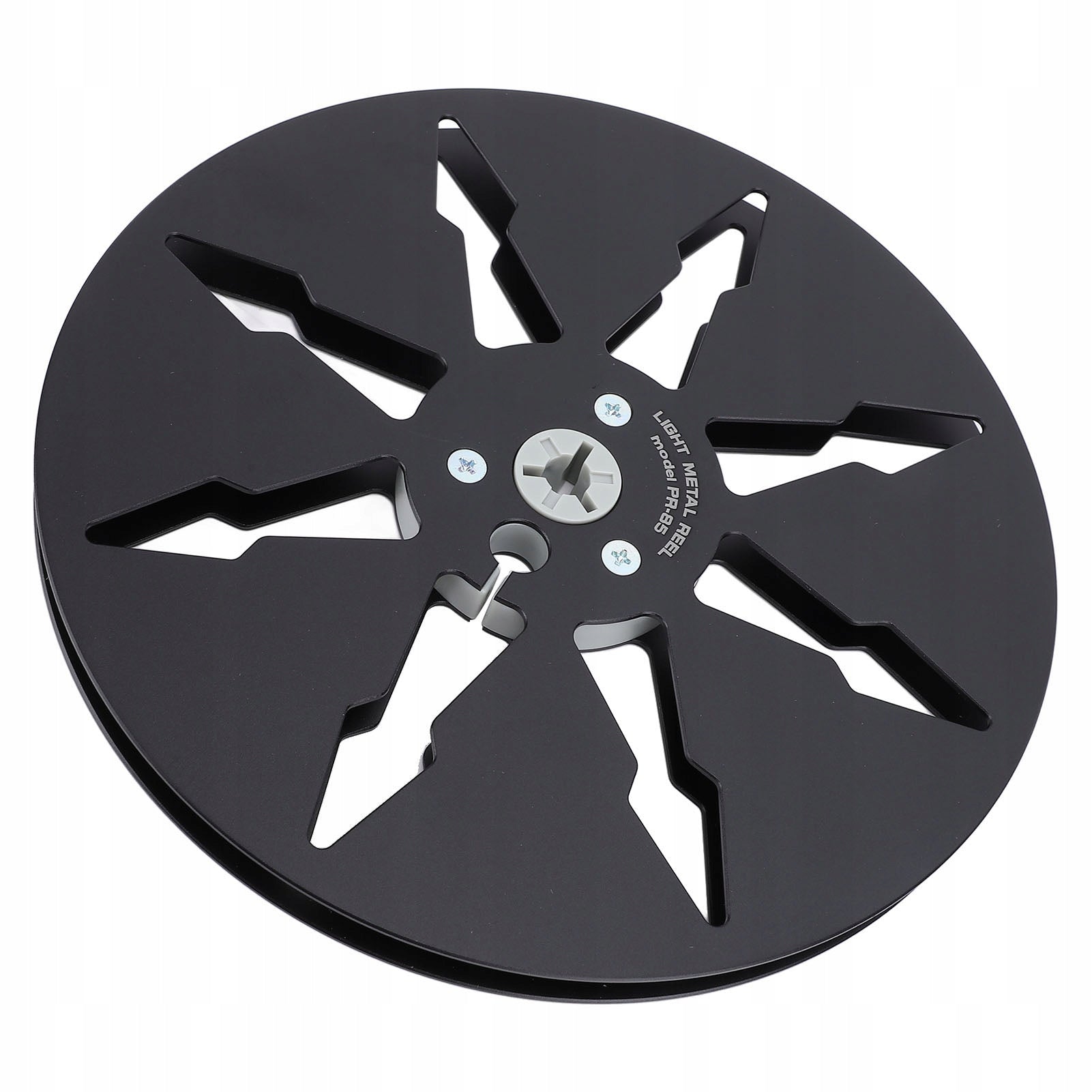 Empty spool with sound tape, 1/4 empty spool with 8 holes for erasure Manufacturer code AG250820018161