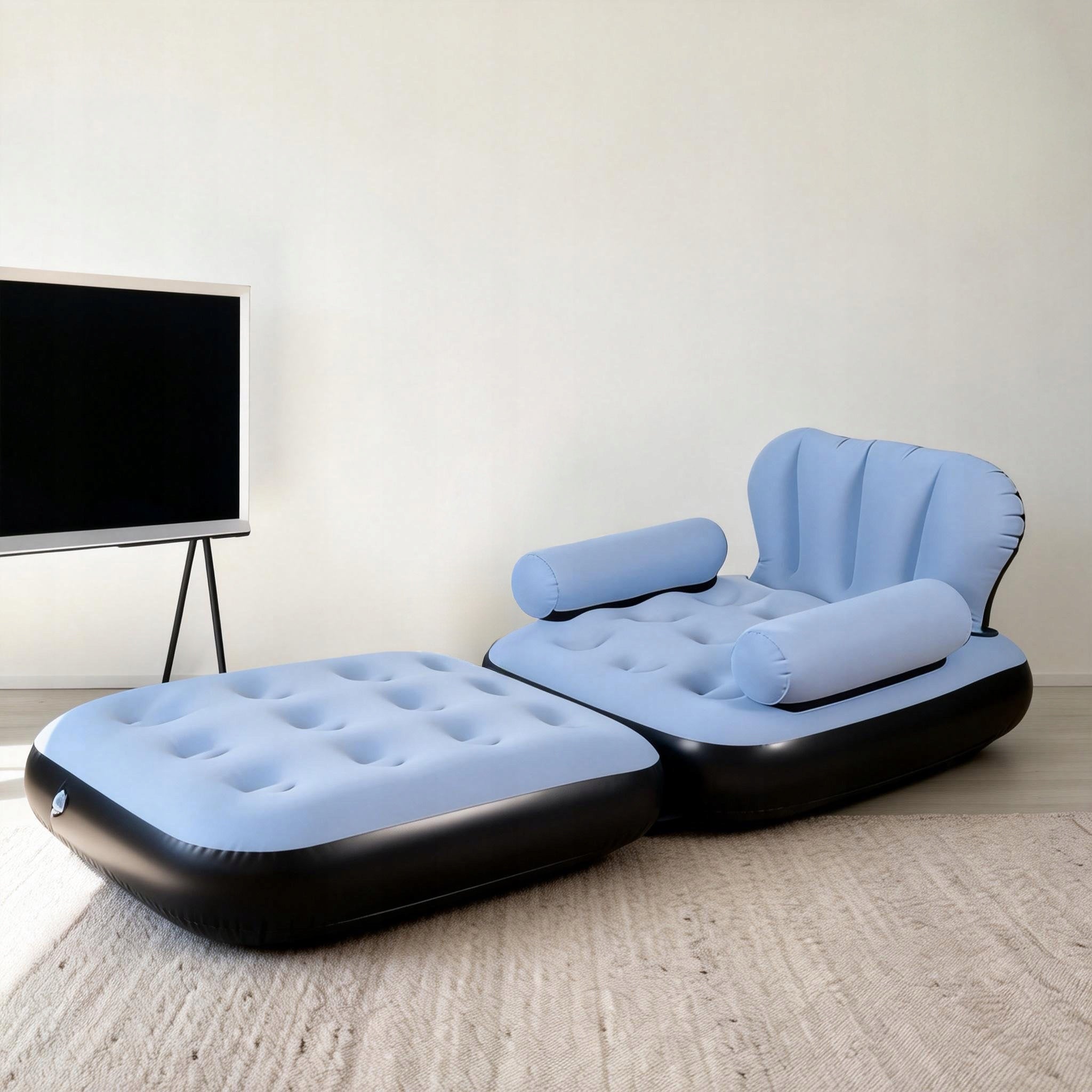 Foldable, inflatable sofa with foot pump.