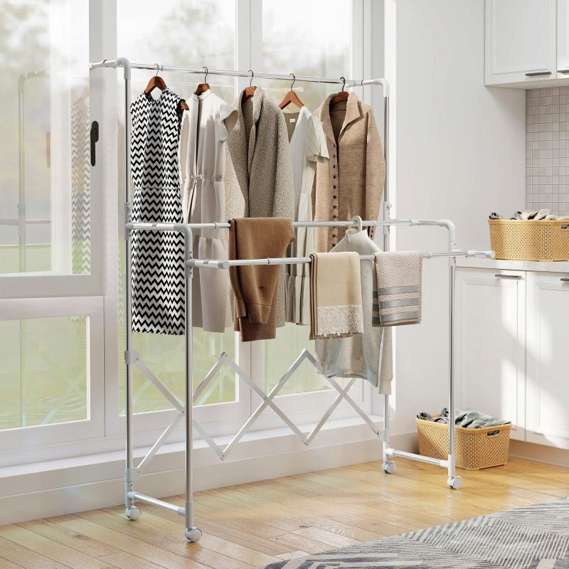 Folding, freestanding clothes hanger with wheels Manufacturer code T3323P410361-1