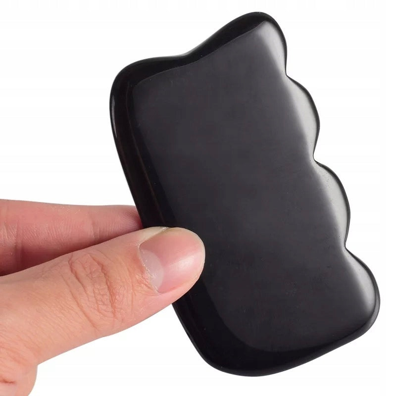 GUA SHA MASSAGE PLATE in the shape of a corrugated rectangle stone bian