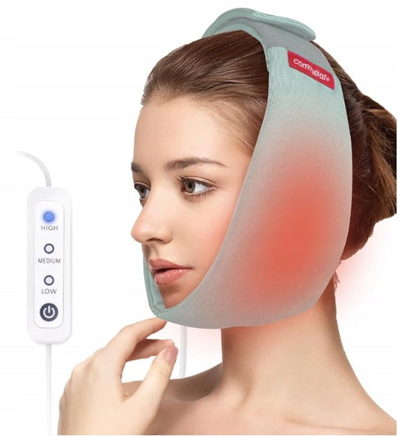 Heated face pad for the treatment of temporomandibular joints