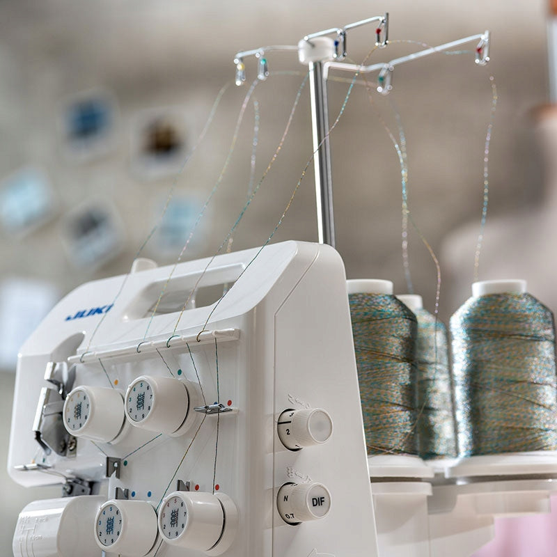 JUKI MO-654DE 4-thread overlock with gripper threader and mere Brand JUKI