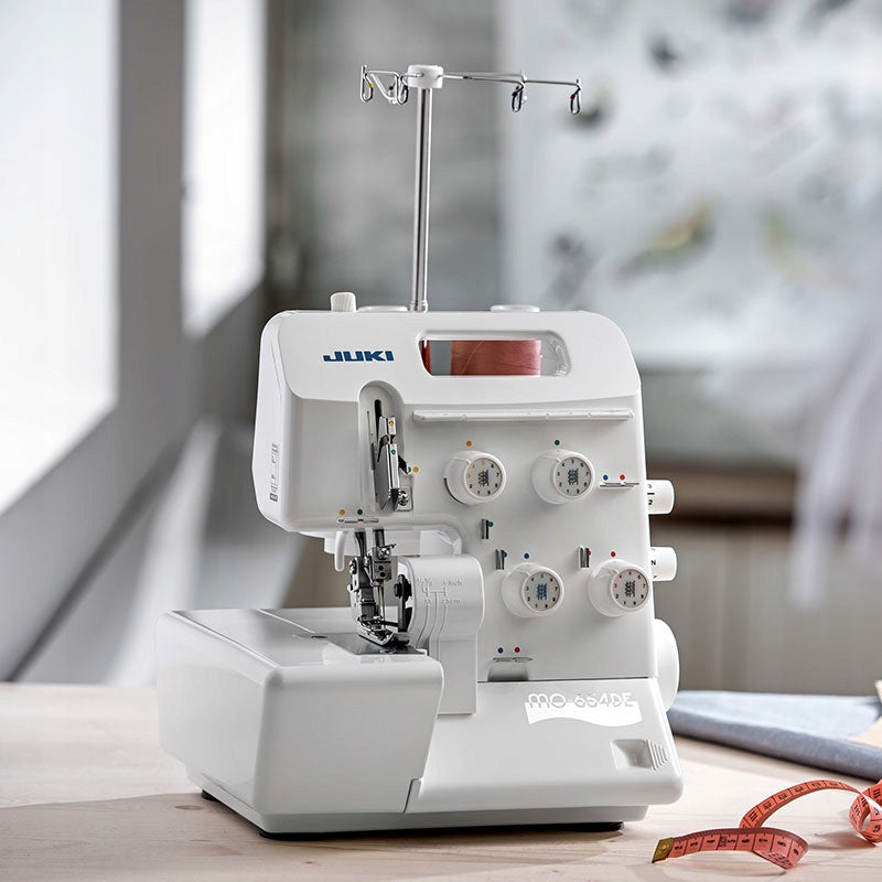 JUKI MO-654DE 4-thread overlock with gripper threader and mere Model MO-654DE