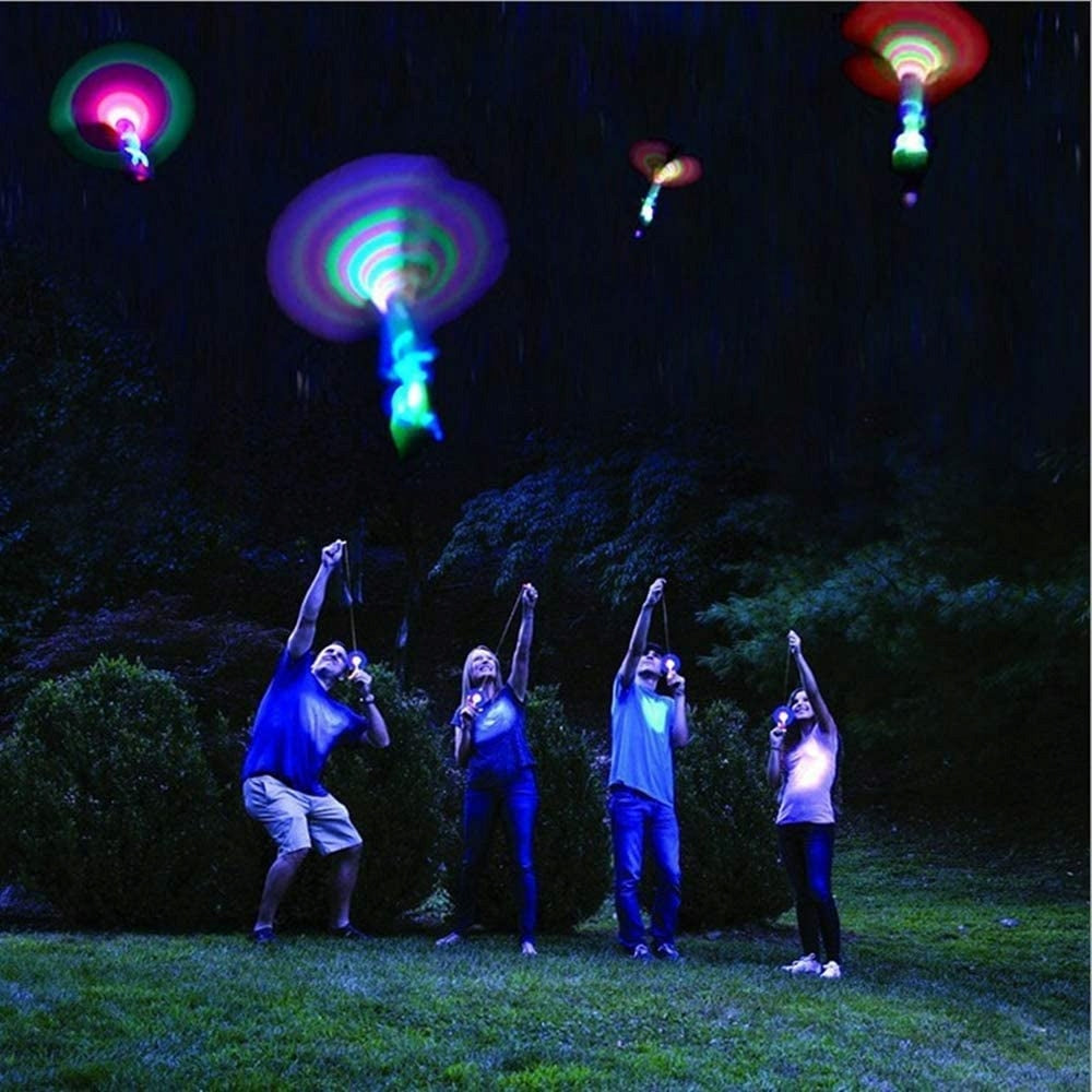 LED HELICOPTER GLOWING WINDMILL SLING AVATAR Flying Windmill Sling Packaging status original