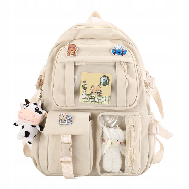 Large capacity student backpack with beige ribbon pendant