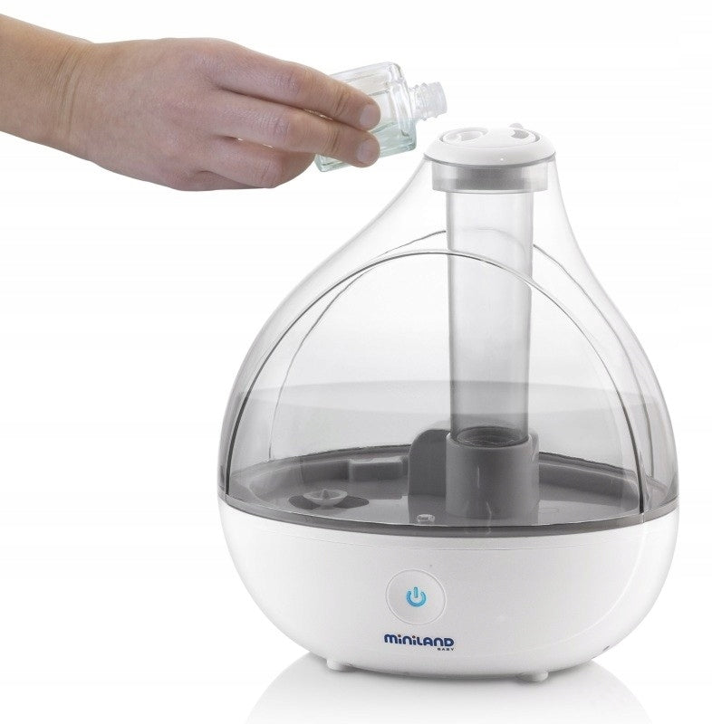 Miniland Ultrasonic air humidifier spraying cool mist Dominant color white