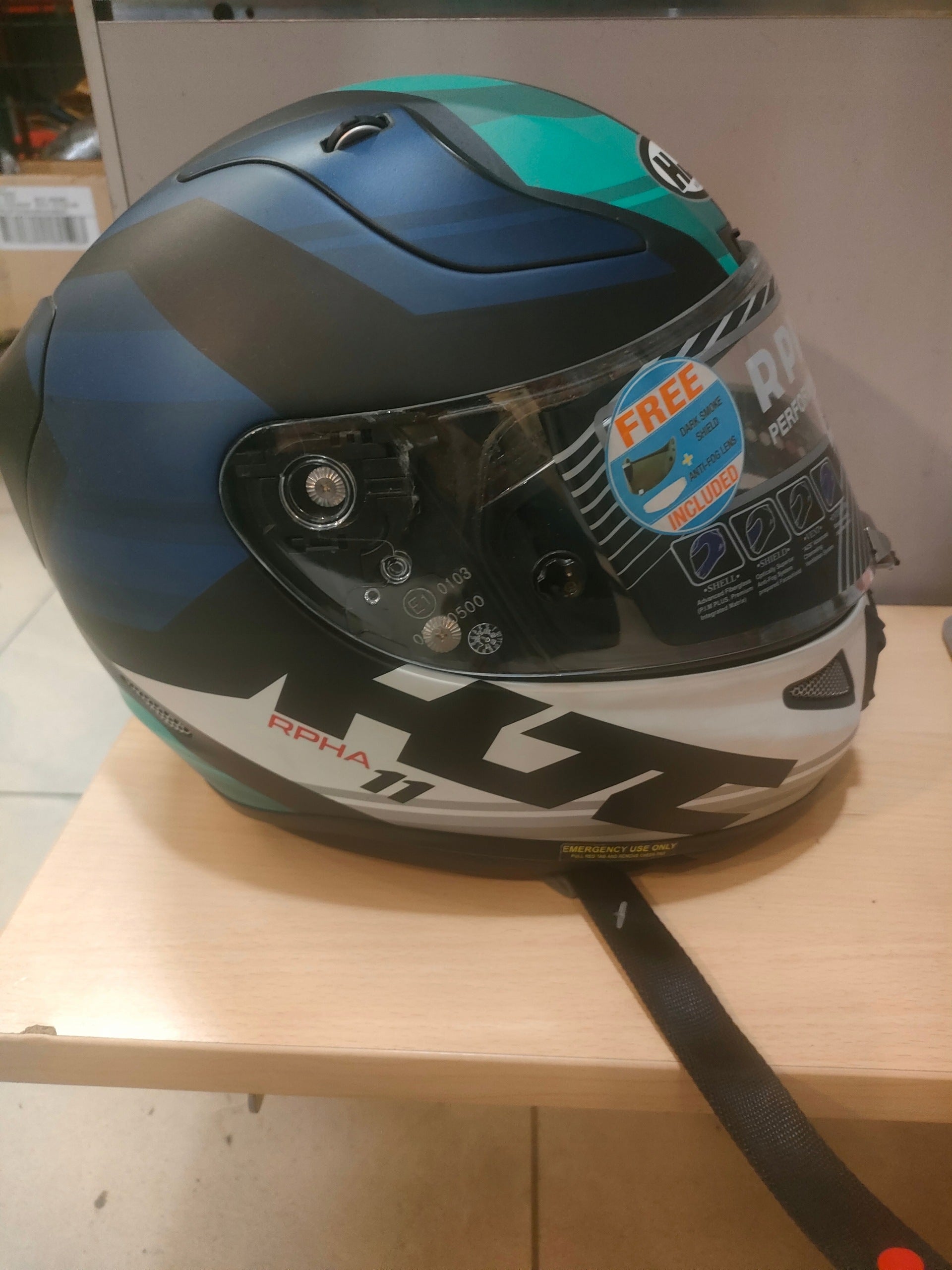 Motorcycle helmet HJC RPHA 11Naxos r. S white and grey blue