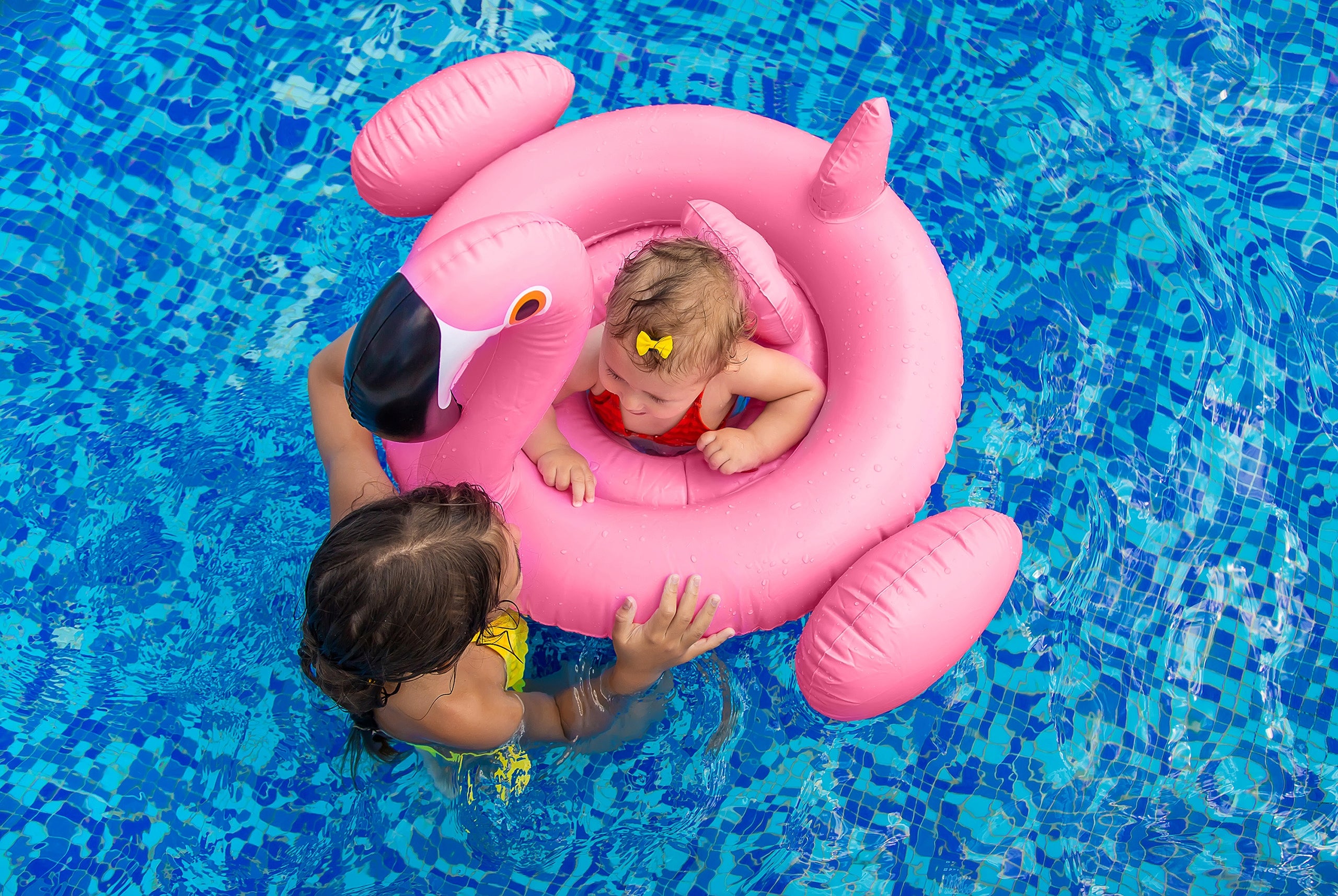 PINK FLAMINGO INFLATABLE SWIMMING WHEEL FOR CHILDREN'S POOL WITH SEAT Kind swim ring