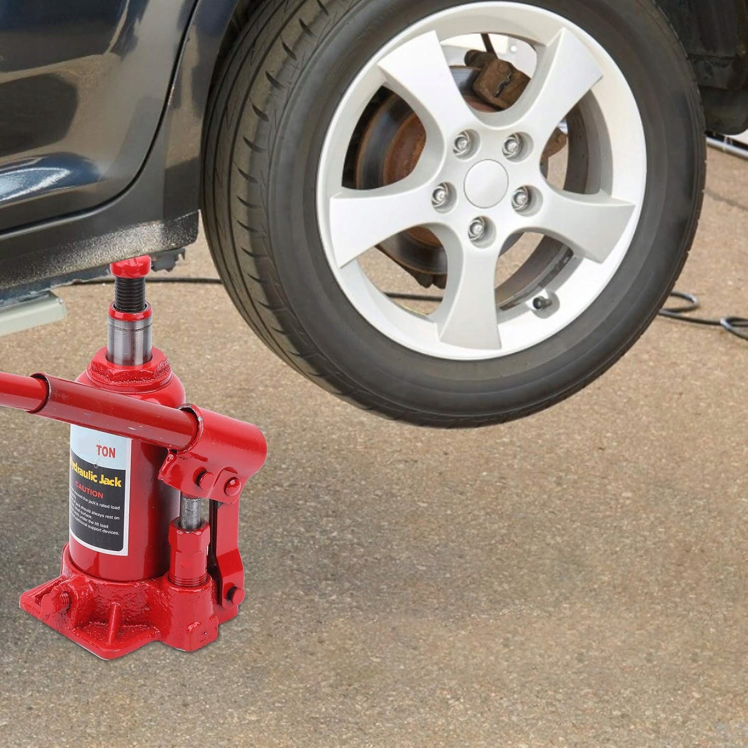 PORTABLE RED 5T HYDRAULIC JACK FOR VEHICLES CHASSIS CONTROL Product weight with unit packaging 2.41 kg