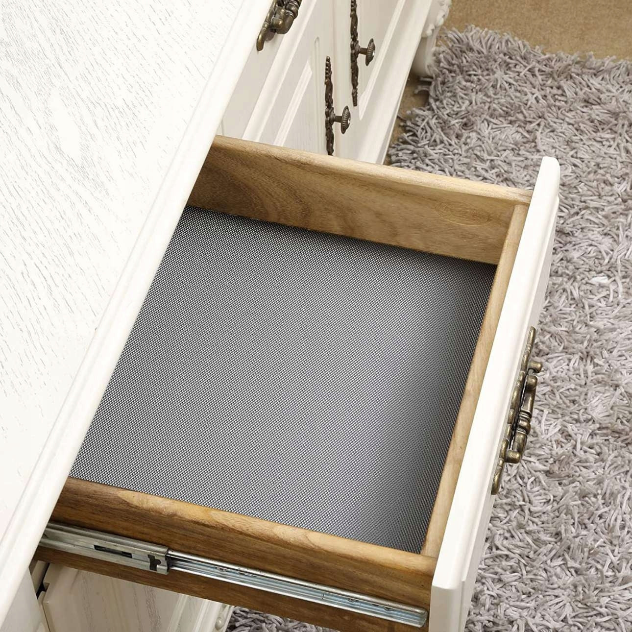 PROTECTIVE MAT NON-SLIP FOR CABINET DRAWERS PAD ROLL 500x48 GREY Manufacturer code 0200031