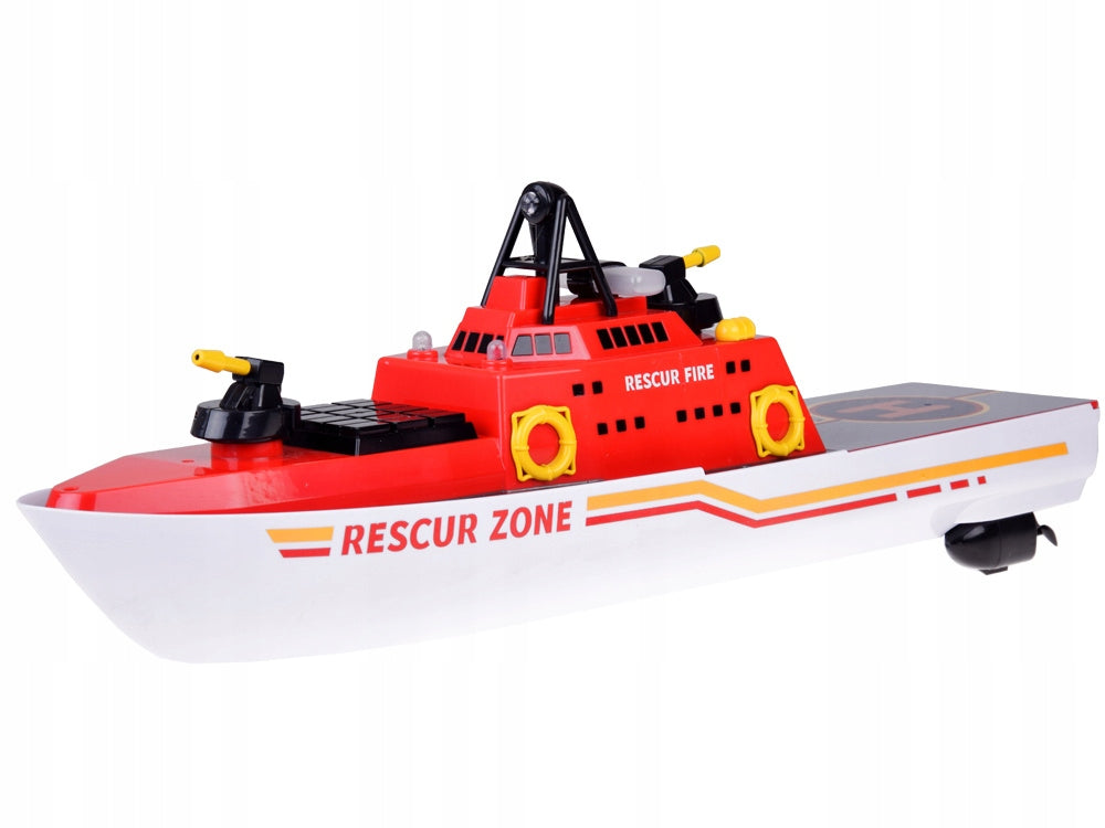 REMOTE CONTROLLED FIRE BOAT SWIMS GLOWS SHOOTS WATER Manufacturer code RC0640
