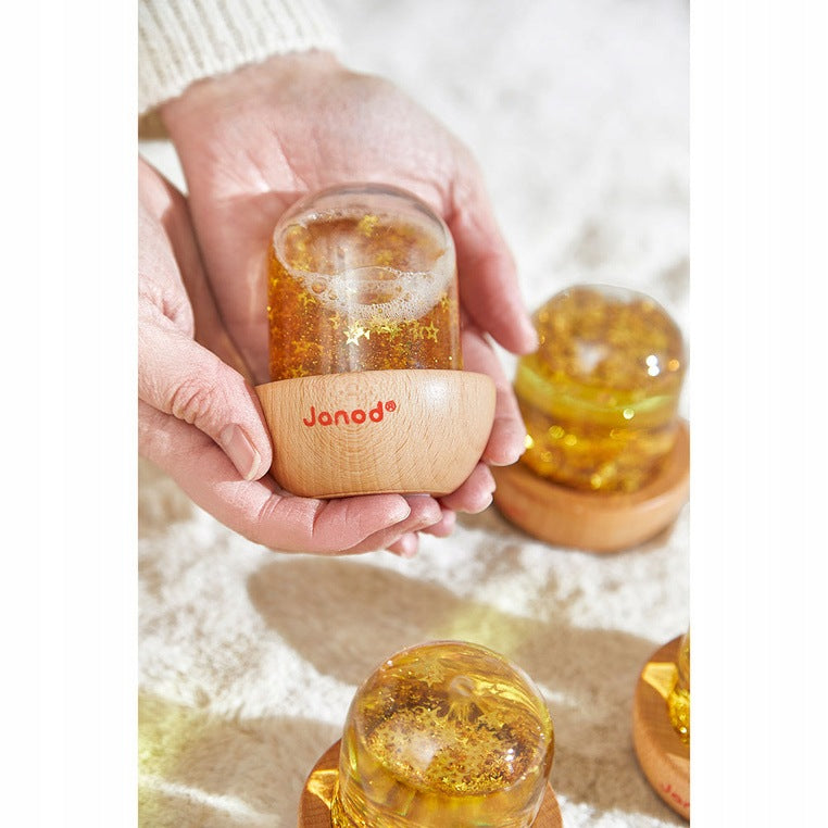 SENSORY SNOWBALL WITH GLITTER YELLOW 12M+ JANOD Manufacturer code janod kula śnieżna sensoryczna z brokatem żół