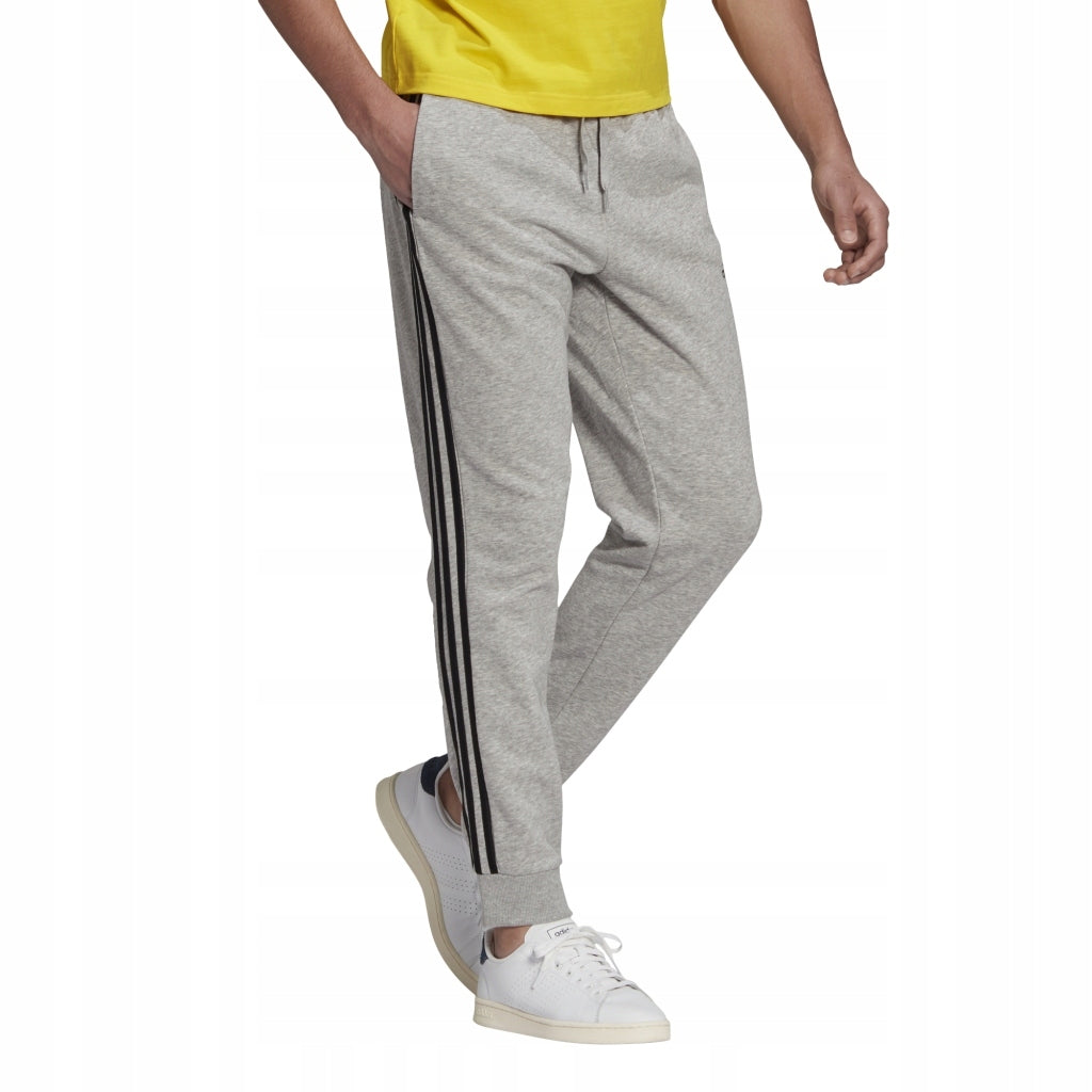 Sporthose für Herren Adidas Essentials Tapered Cuff 3 Stripes M GK8889, grau 