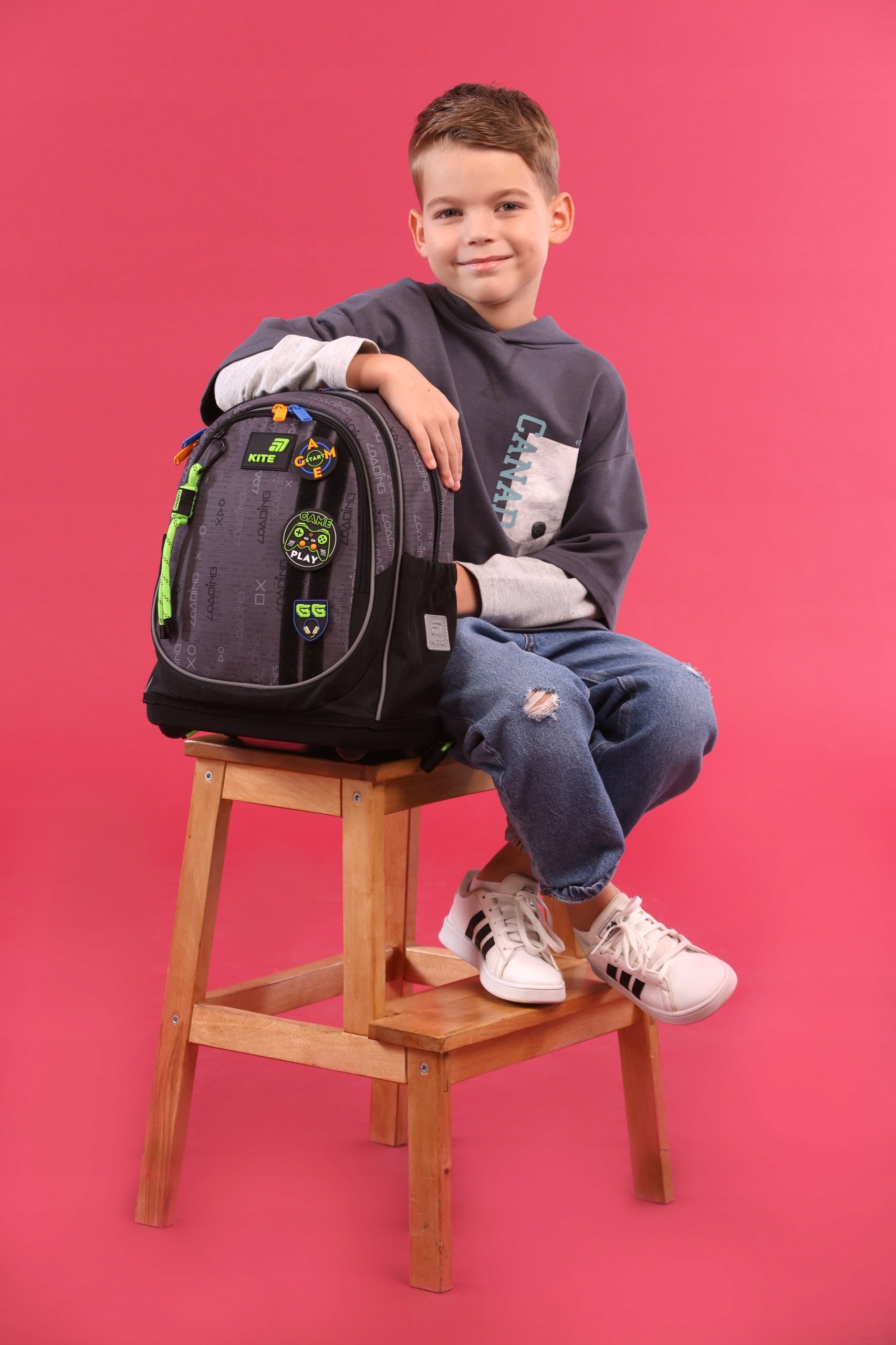School backpack for boys up to 1-4 class grey on legs with patches Kite Packaging status original