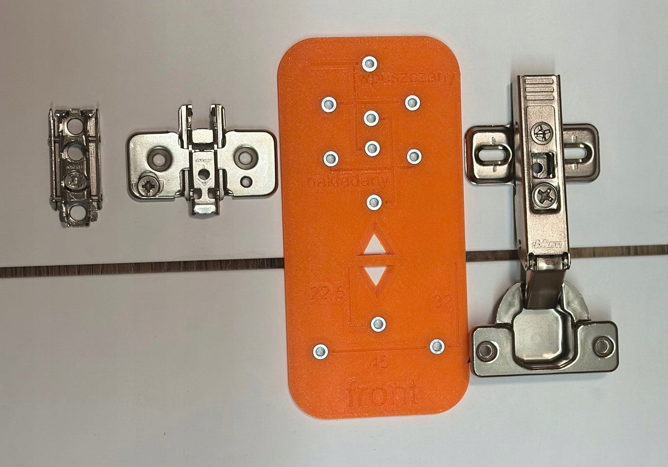Template for universal recessed hinge can guides