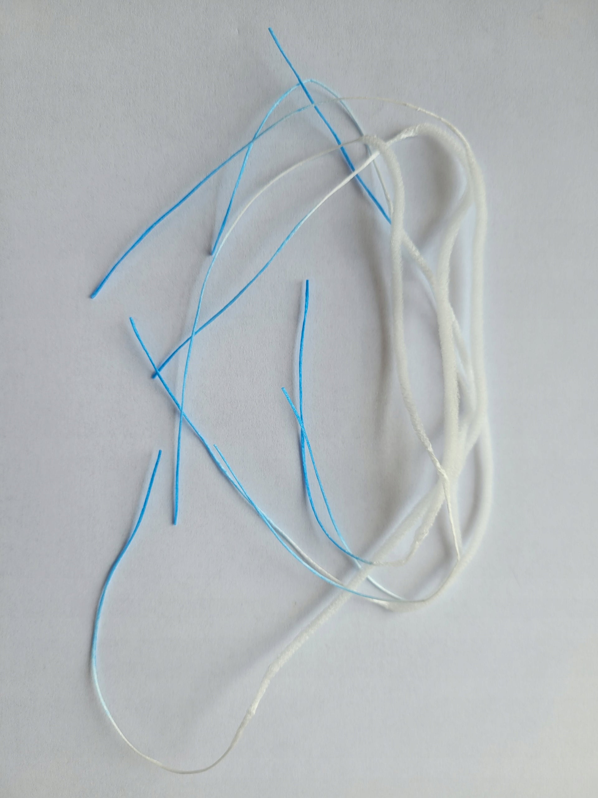 Threads for cleaning thin hoses and hearing aid soundguides