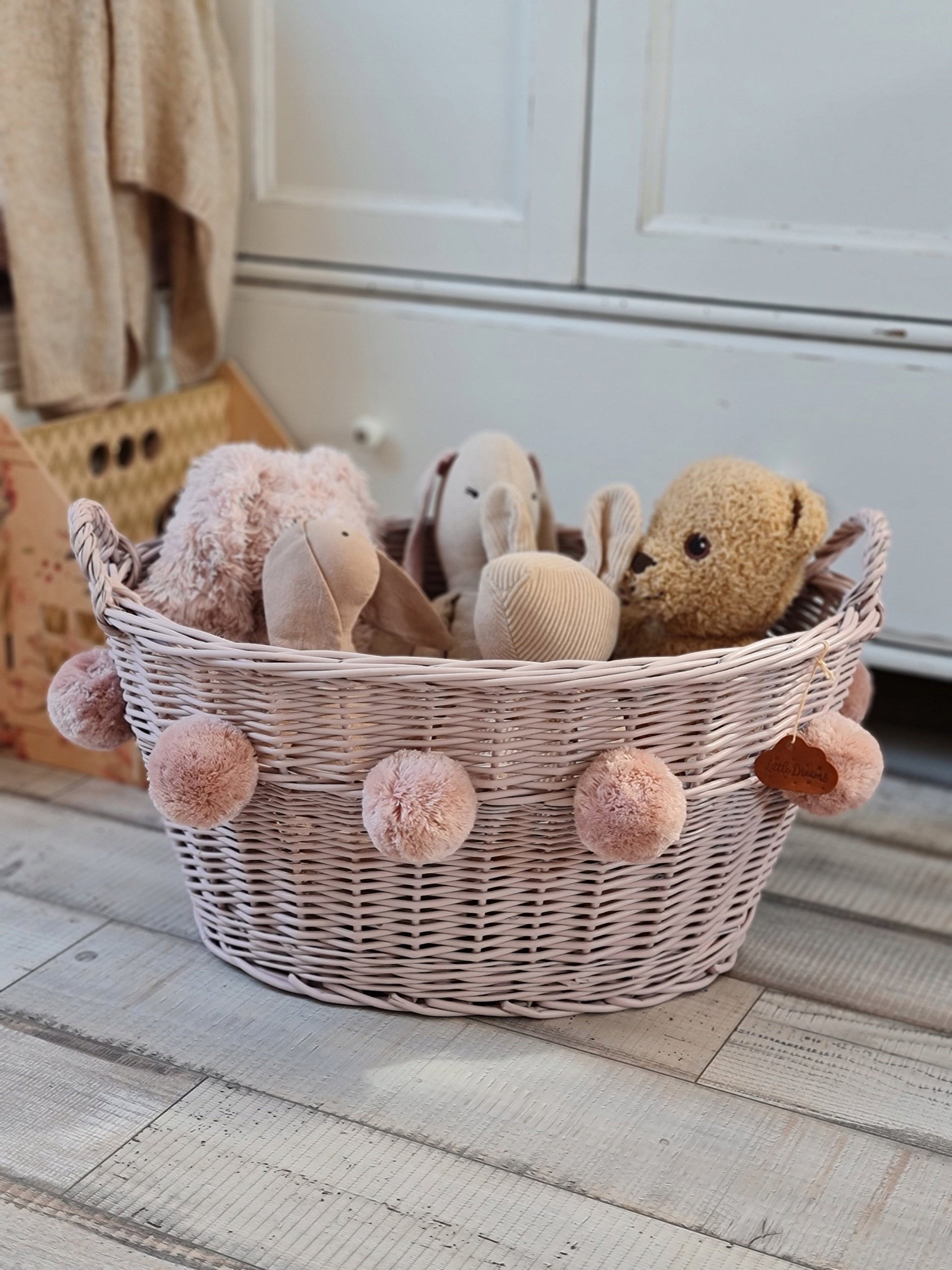 WICKER BASKET FOR TOYS DIRTY PINK OVAL POMPOM Color pink