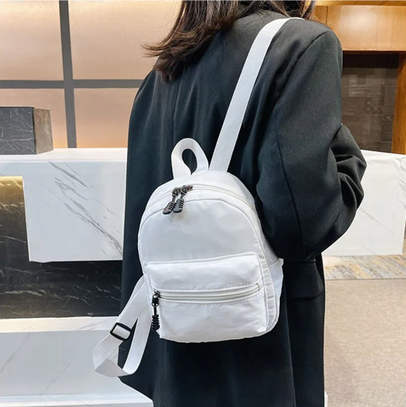 WOMEN'S BACKPACK, SMALL TOURIST, LIGHT, FOR A TRIP, WALK, WHITE Kind sports