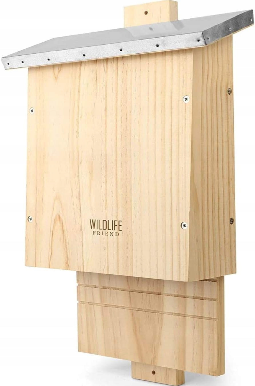 ready wooden nesting house for bats with metal canopy