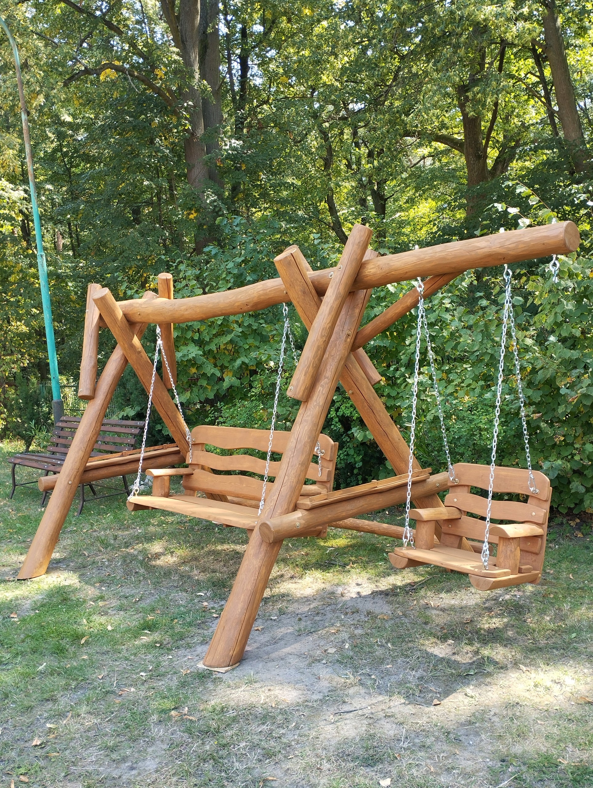 wooden garden swing with logs playground